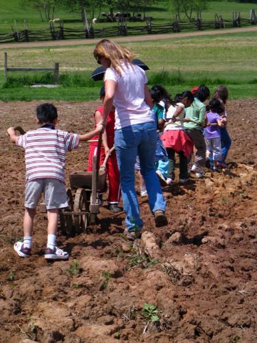 1_Kids_Planting_Corn.jpg