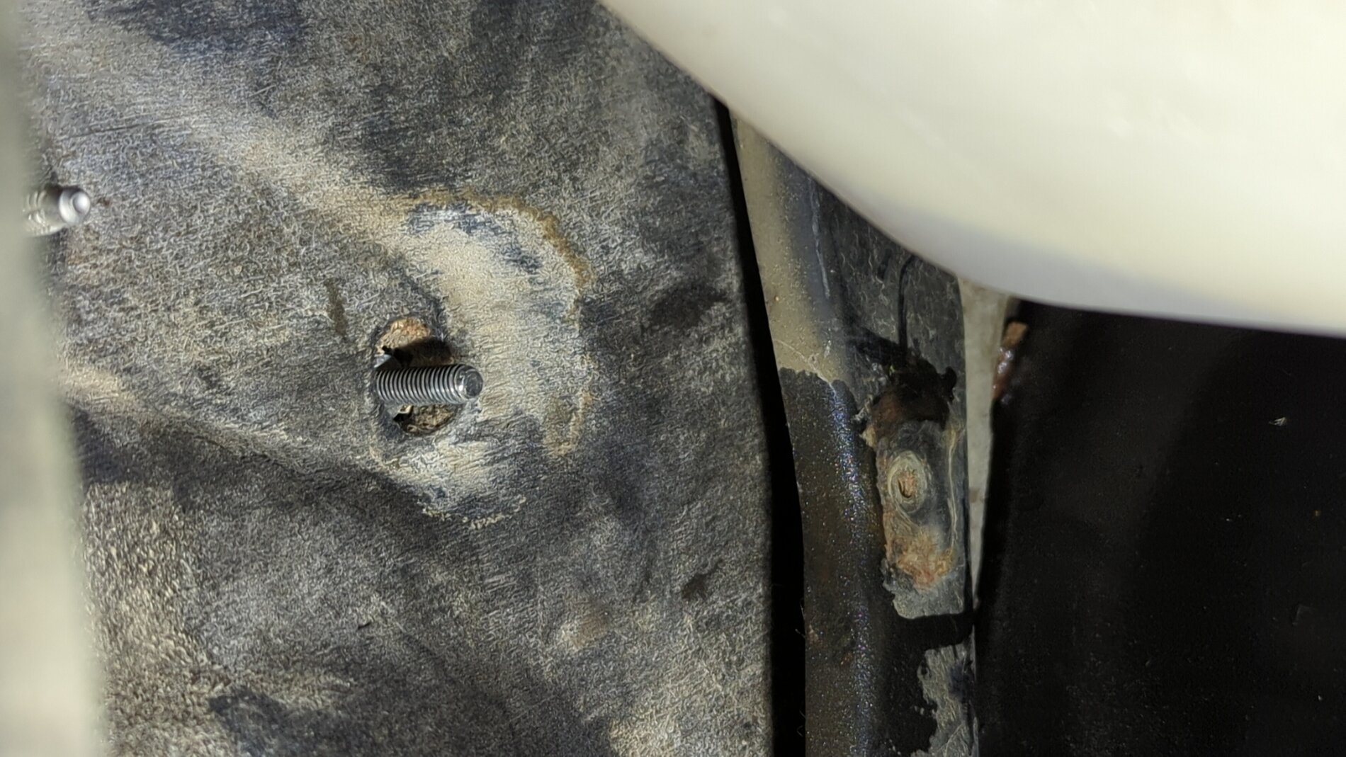 bolt behind coolant tank.jpg