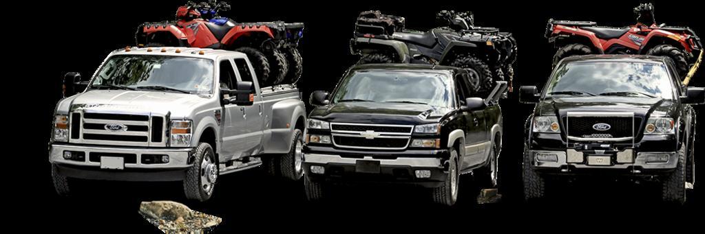 three-pickup-trucks-with-diamondback-atv-haulers.jpg