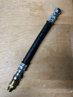 Trans cooler line with check valve.jpg