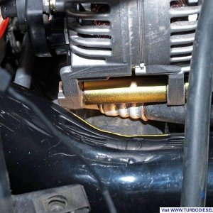 Closeup of the AC hose interference issue