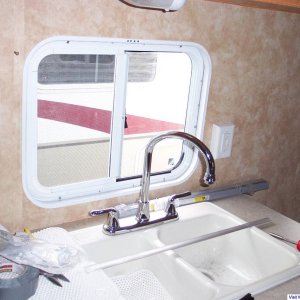 Kitchen/couch slider window