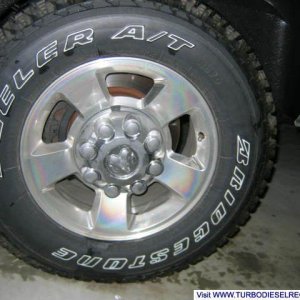 Polished alum wheel and 265/70-R17 "E" Bridgestone Dueler AT Revo