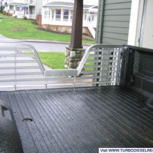 Husky alum 5th wheel tailgate and Pullrite mounting holes in bed