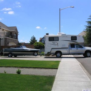 Eagle Cap 950 camper and Reinell 190BRXL