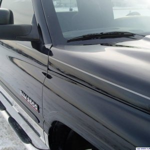 I had the radio antenna removed...........who needs it?