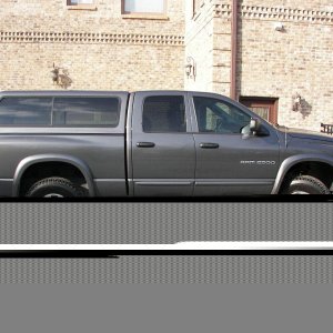 My '03 with 2" front and 1" rear lift and 2008 H2 rims and 315/70