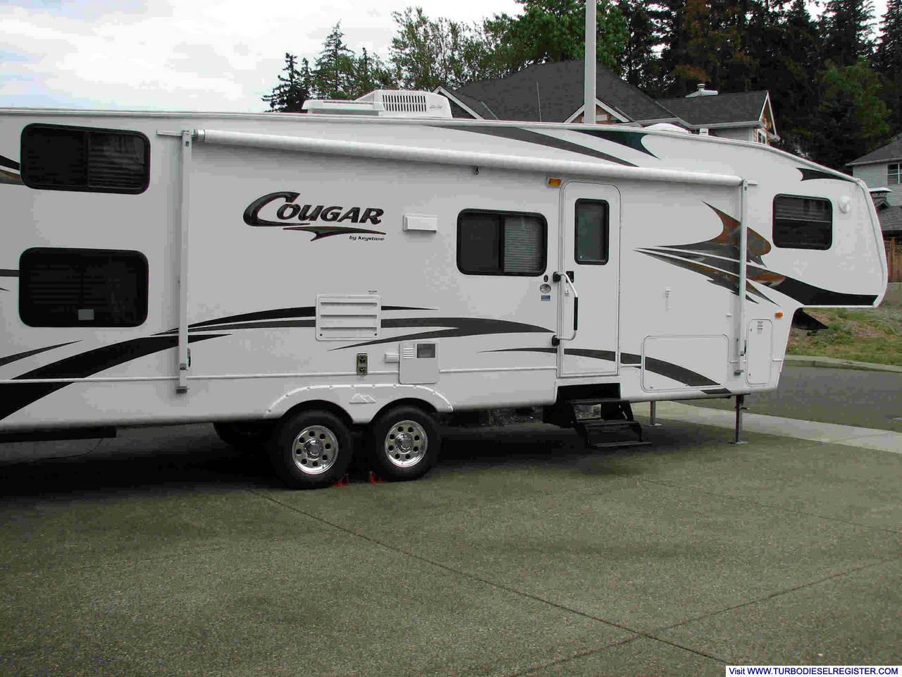 '06 Cougar barely fits in driveway