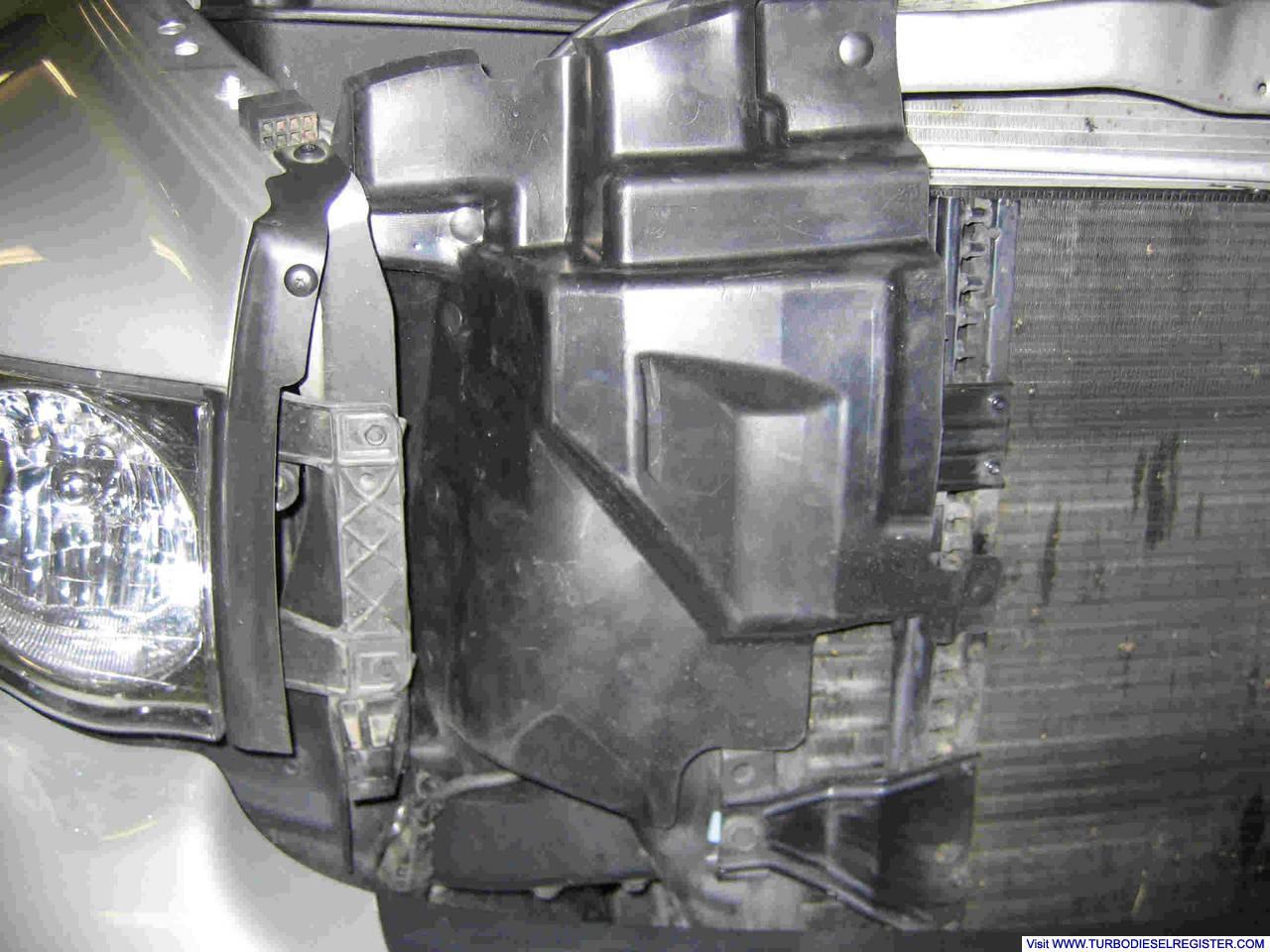 Added RH baffle from '04.5 to keep cooling package air from recircing