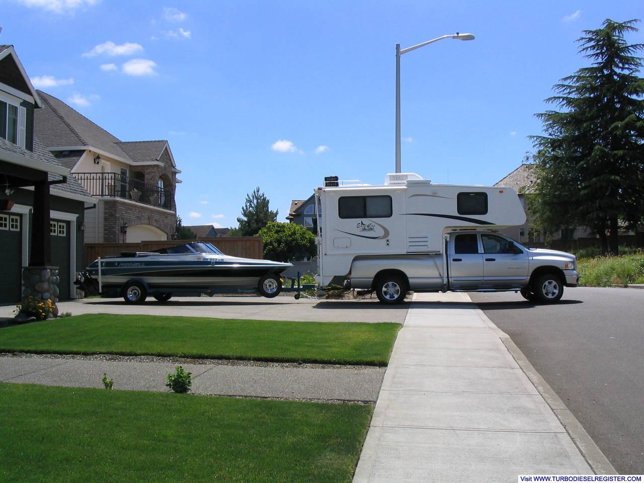 Eagle Cap 950 camper and Reinell 190BRXL