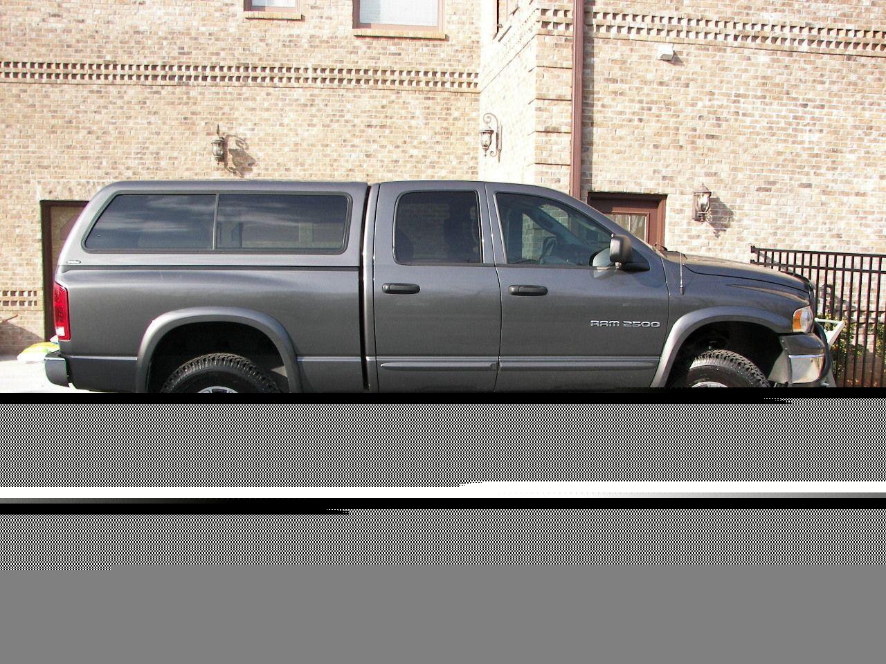 My '03 with 2" front and 1" rear lift and 2008 H2 rims and 315/70
