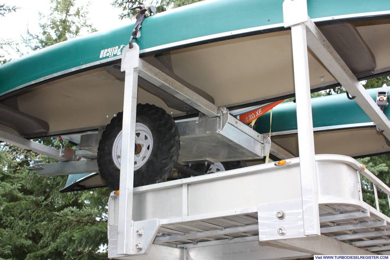quad trailer mounted under boat rack