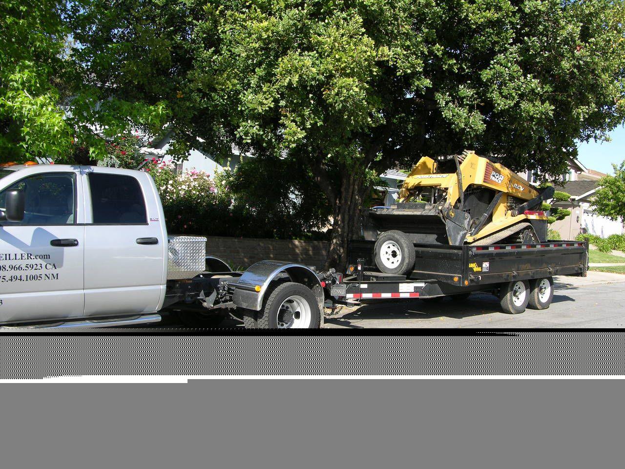RAM 5500 with dump trailer and ASV RCV track loader 2