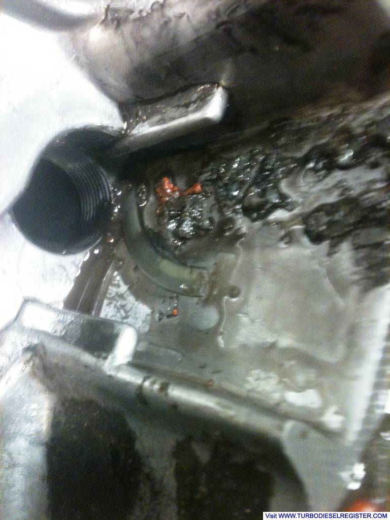 T-case sludge